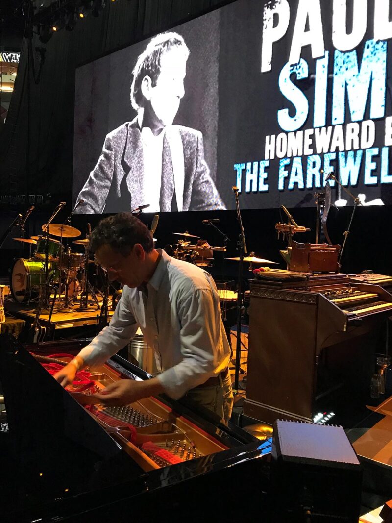 Steven Malicki working at a grand piano